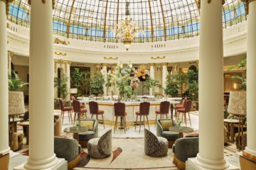 Eingangshalle mit Glaskuppel im The Palace Hotel Madrid