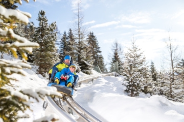 Winteraktivitäten im Trentino: Rodeln mit der Familie