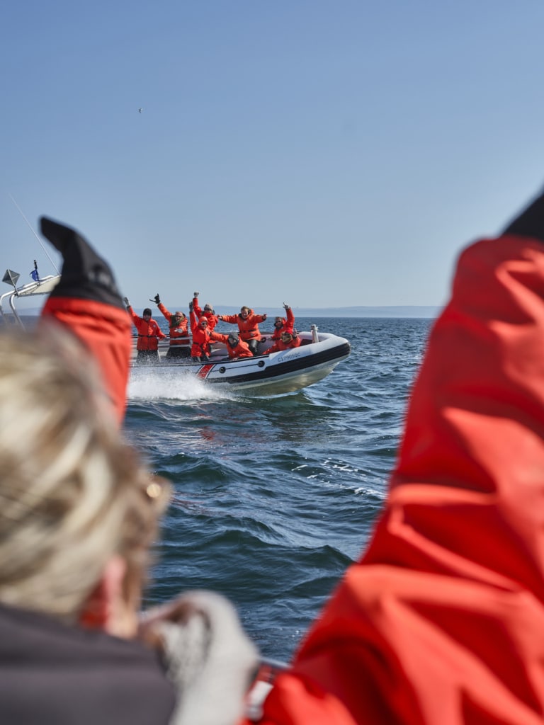 A group goes whale watching in Tadoussac, Quebec, Canada