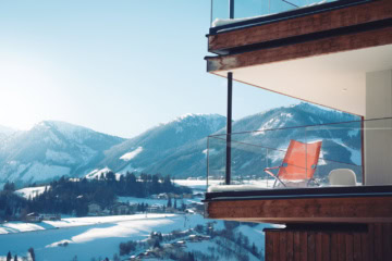 Aussicht auf die schneebdeckten Berge in den Schladming Appartments
