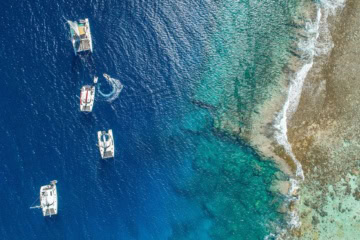 Tahiti-Urlaub: Schiffe in der Südsee.