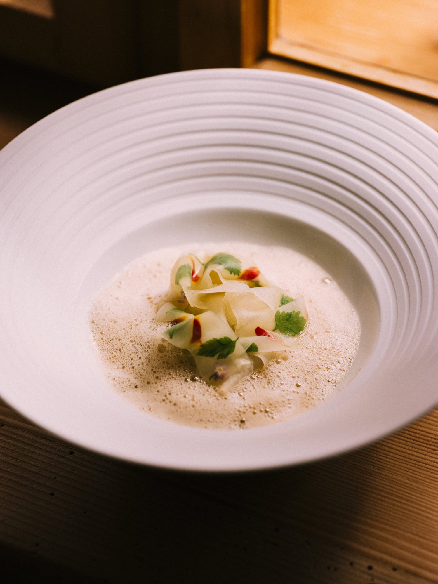 Gericht auf einem Teller im Rote Wand Chefs Table