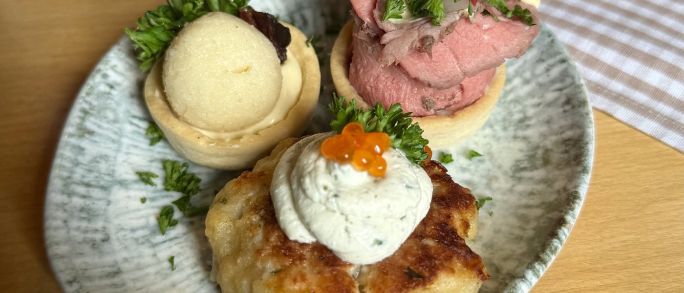 Essen in Graz: Häppchen auf einem Teller.
