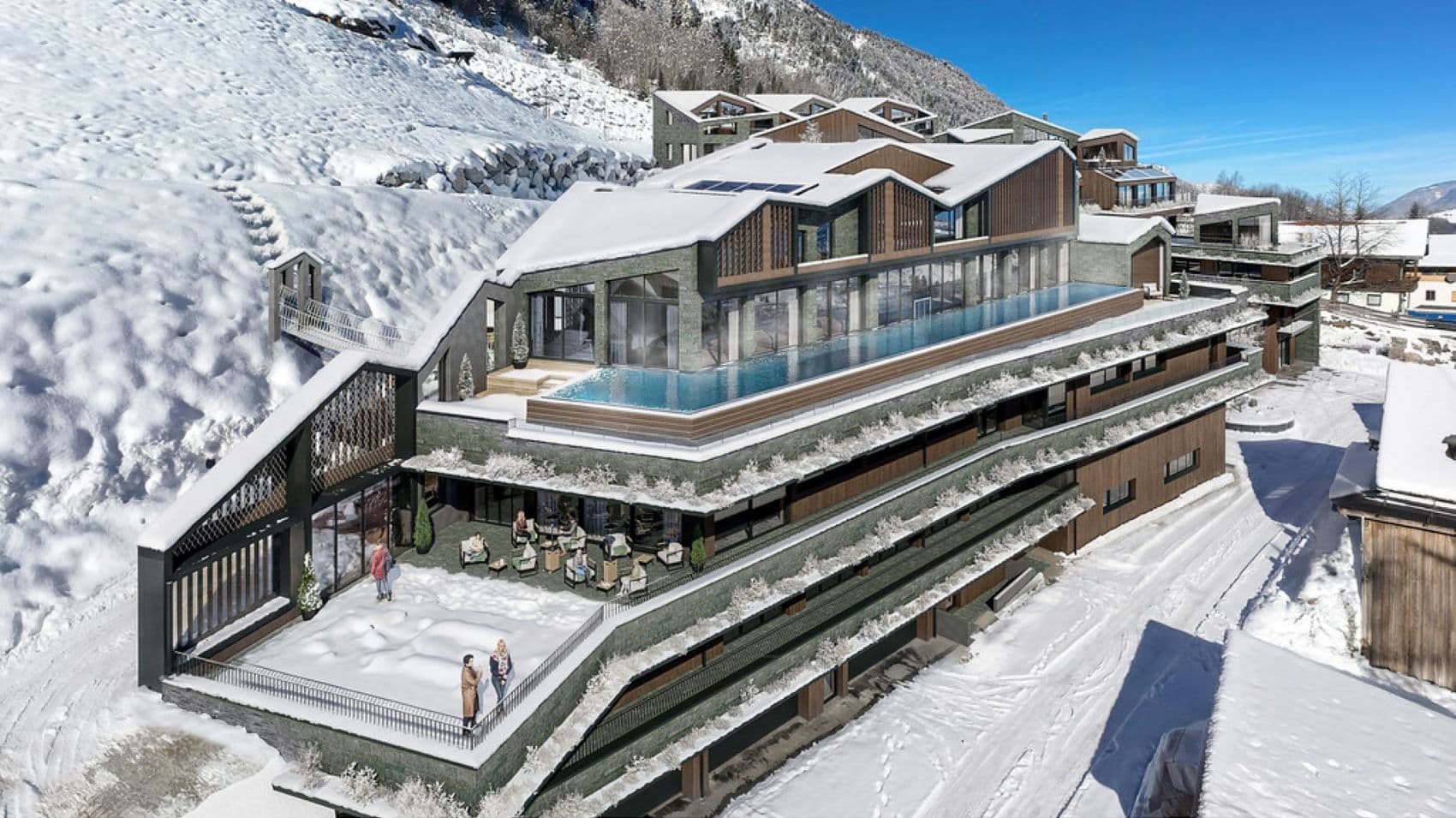 Außenvisualisierung des glockna am Großglockner mit Infinitypool, Natursteinfassade, großzügigen Terrassen und fünf Berghäusern vor verschneiter Berglandschaft.