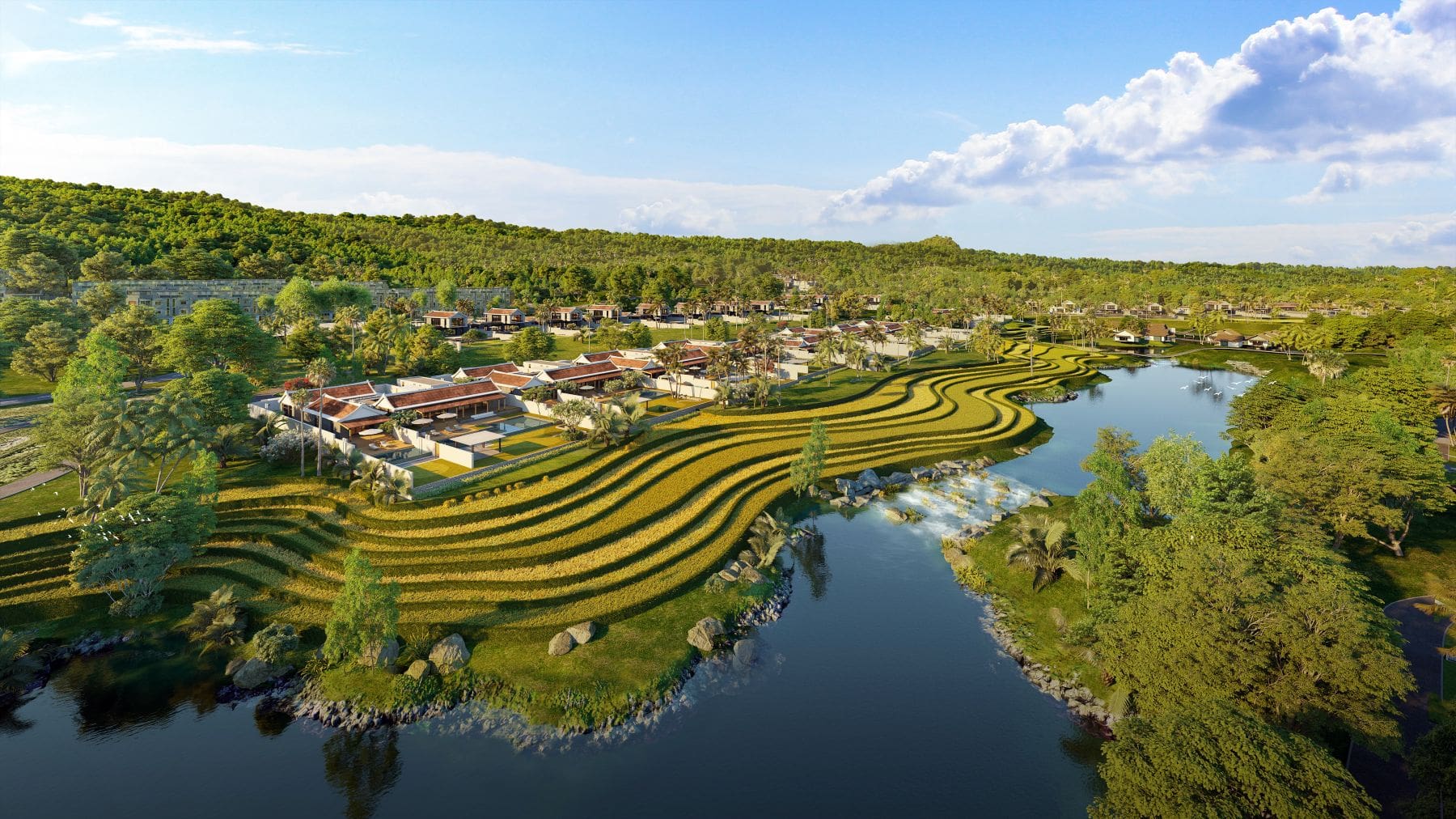 Luftaufnahme des Park Hyatt Phu Quoc mit terrassierten Reisfeldern, Wasserlandschaft, tropischen Bäumen und Villen mit roten Ziegeldächern.